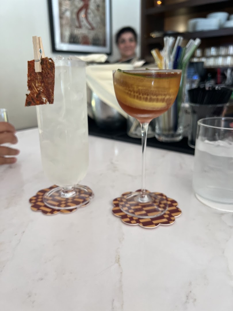 Known Associates: appetizing cocktails in bar setting