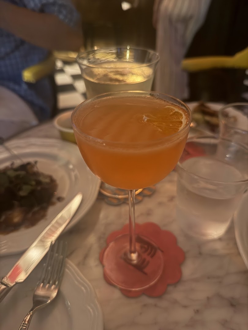 Known Associates: appetizing cocktail photo in venue
