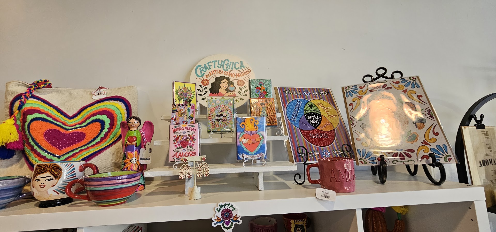 Amor Collective: clear display of shop products