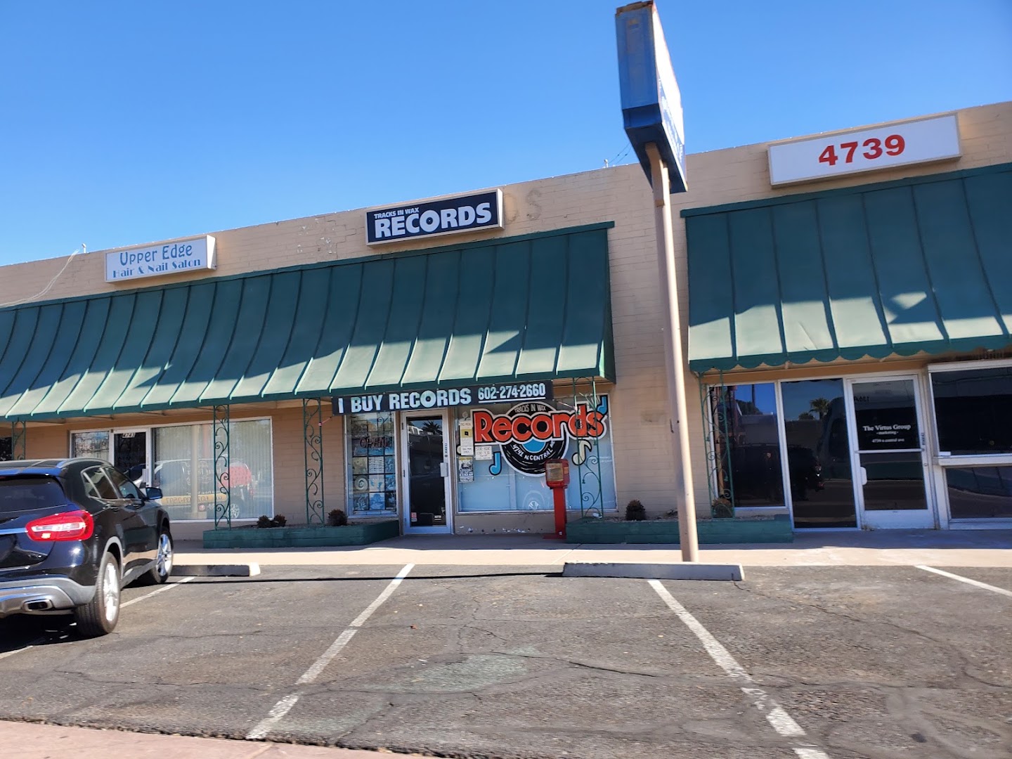 Tracks in Wax: clear storefront photo of shop