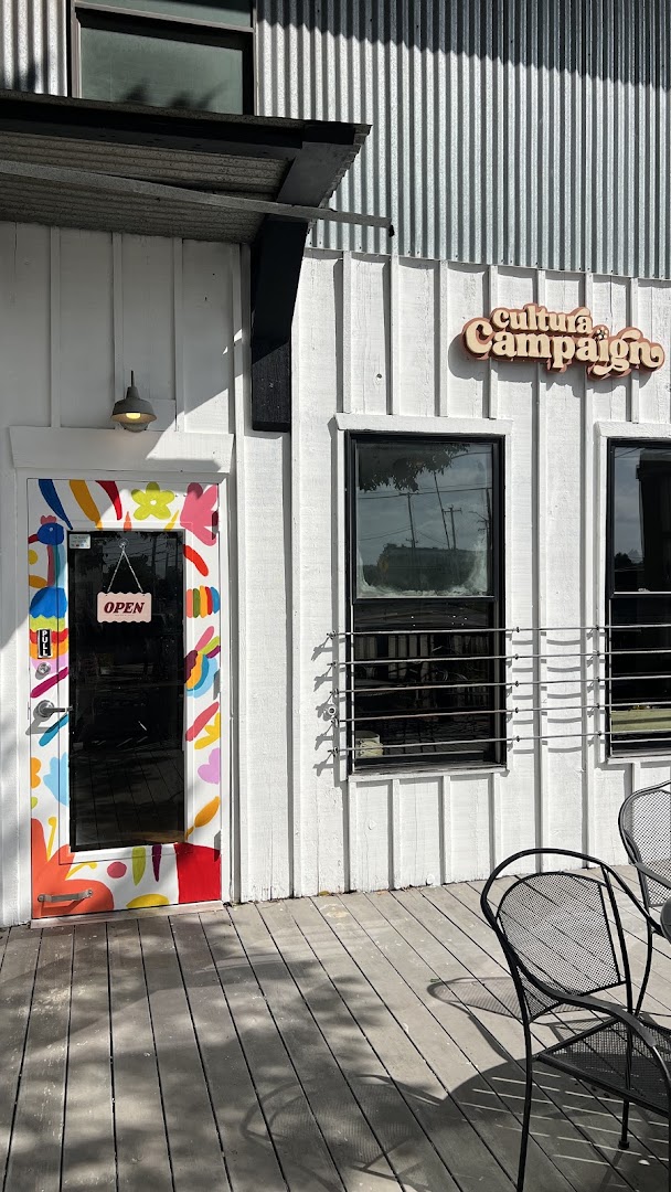 Cultura Campaign: clear storefront photo showing branding