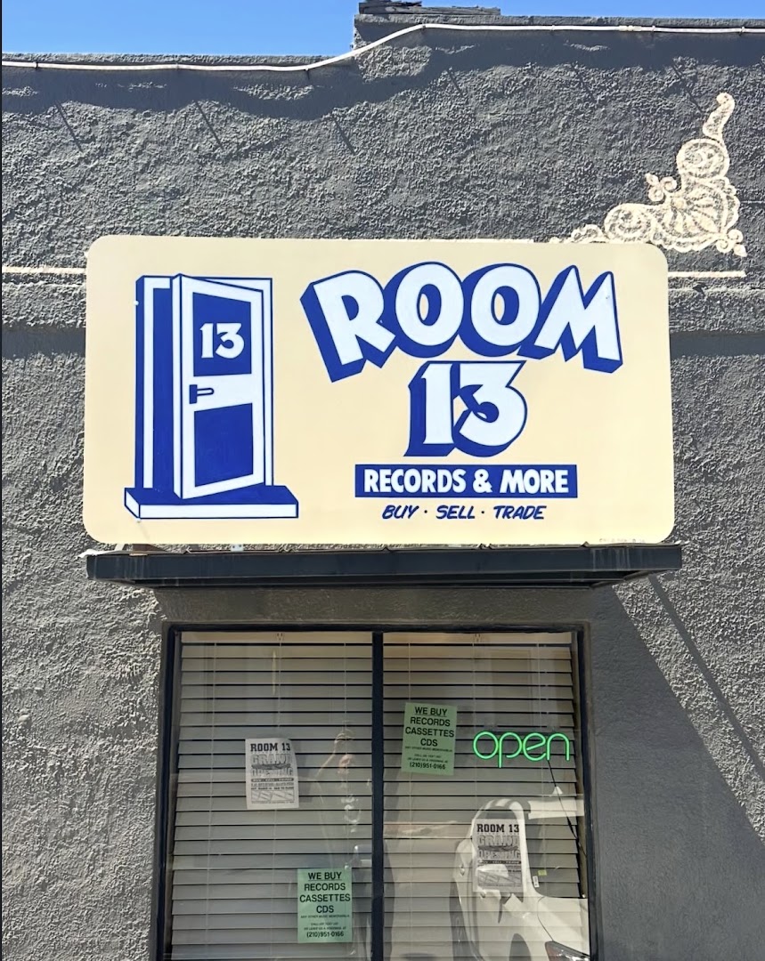 Room 13 Records: clear storefront signage and branding
