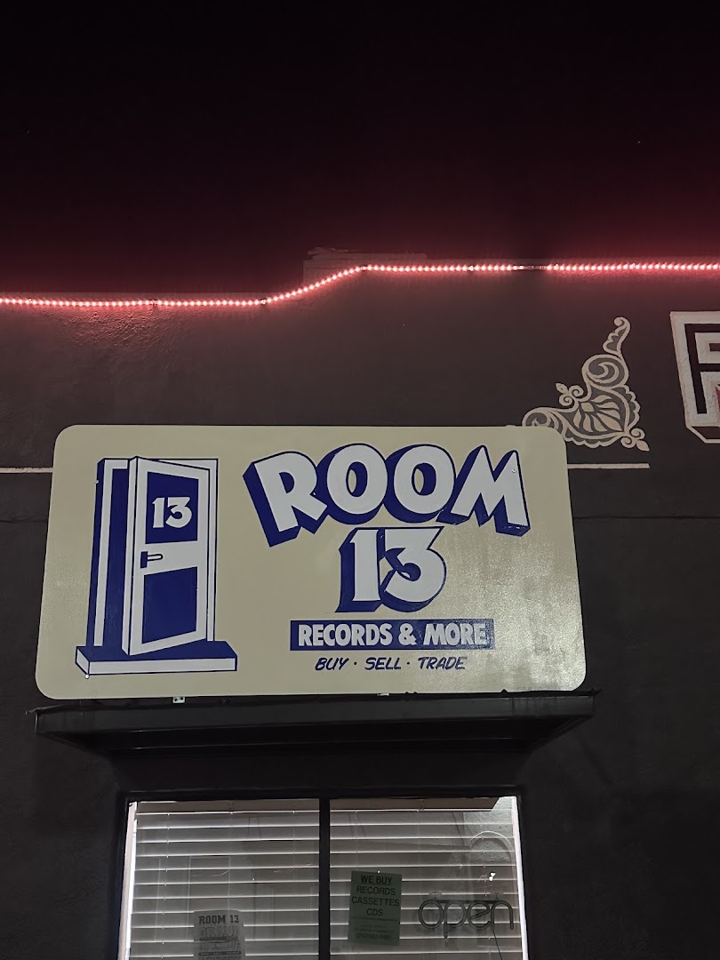 Room 13 Records: clear storefront signage at night