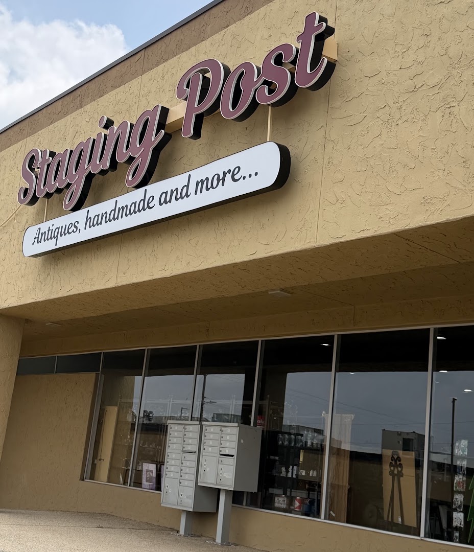 The Staging Post: clear storefront photo showing signage