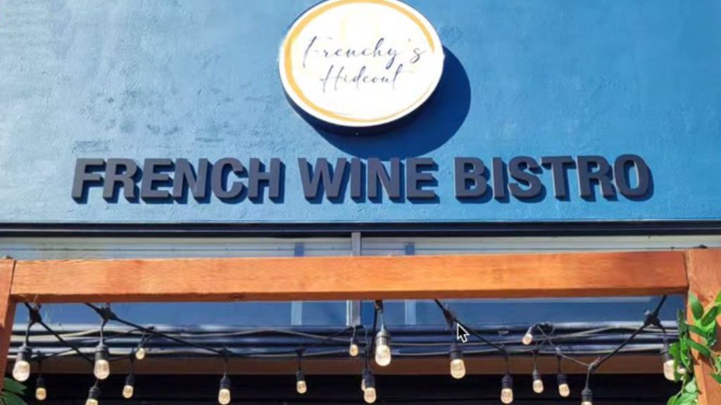 Frenchy's Hideout: clear, professional storefront signage photo