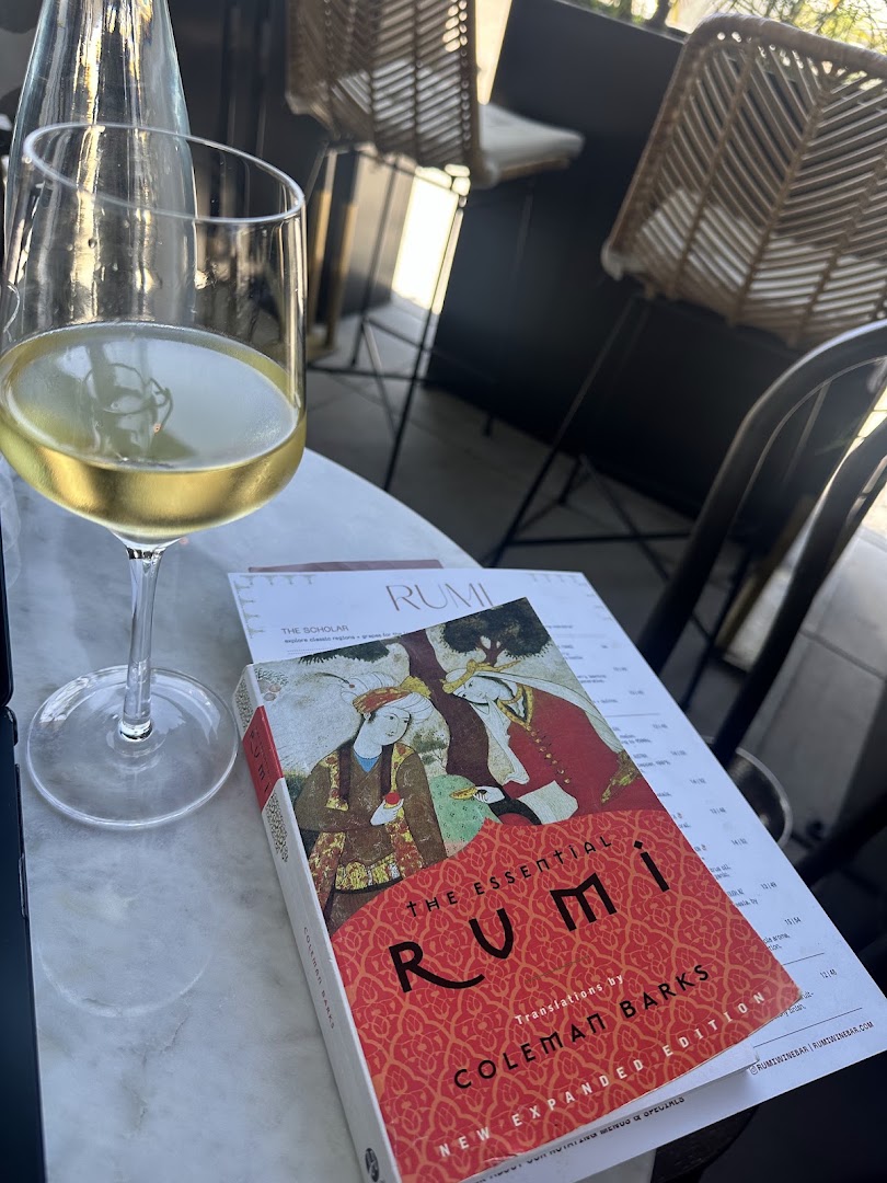 Rumi: inviting atmosphere with drink shown