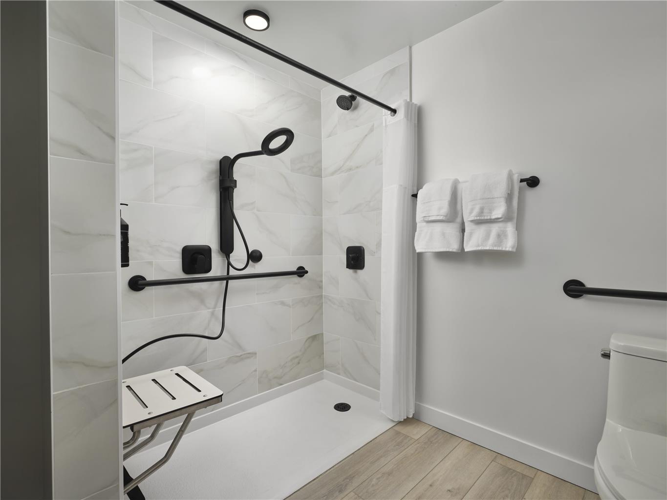 The Margot Hotel: clean professional hotel bathroom photo
