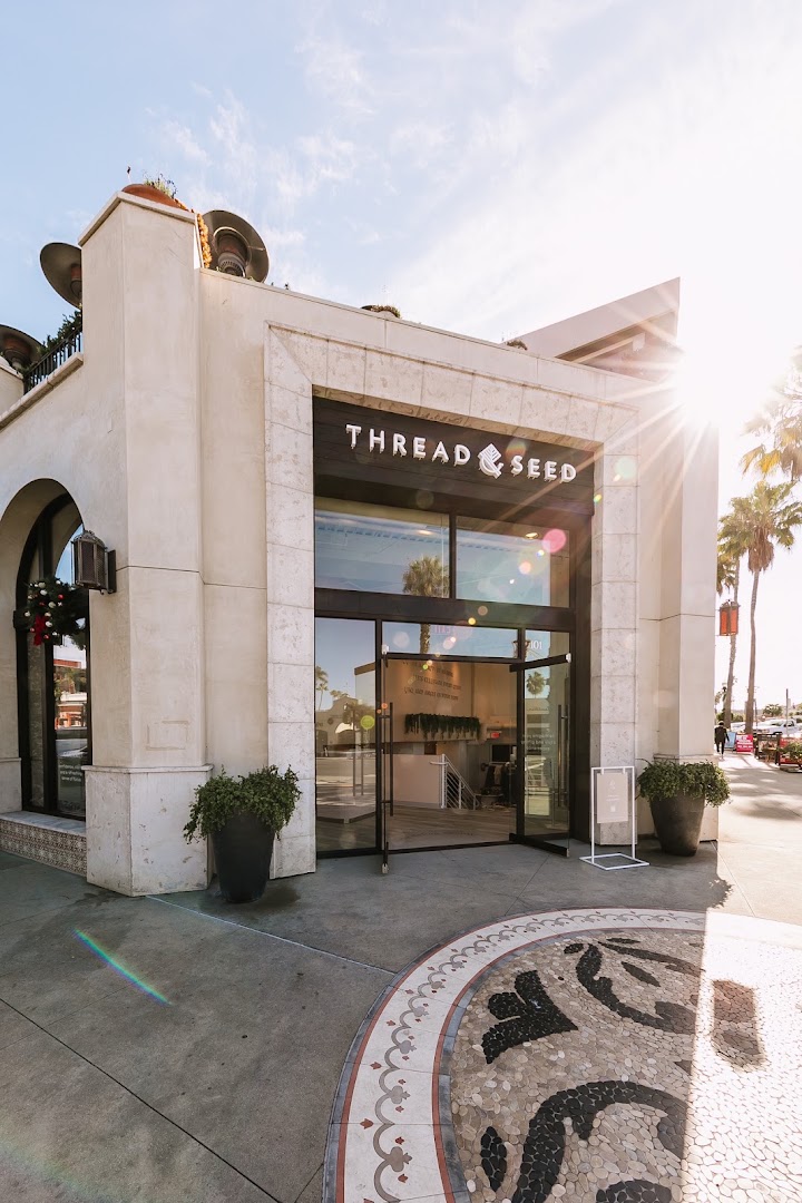 Thread + Seed La Jolla: professional storefront photo with lighting
