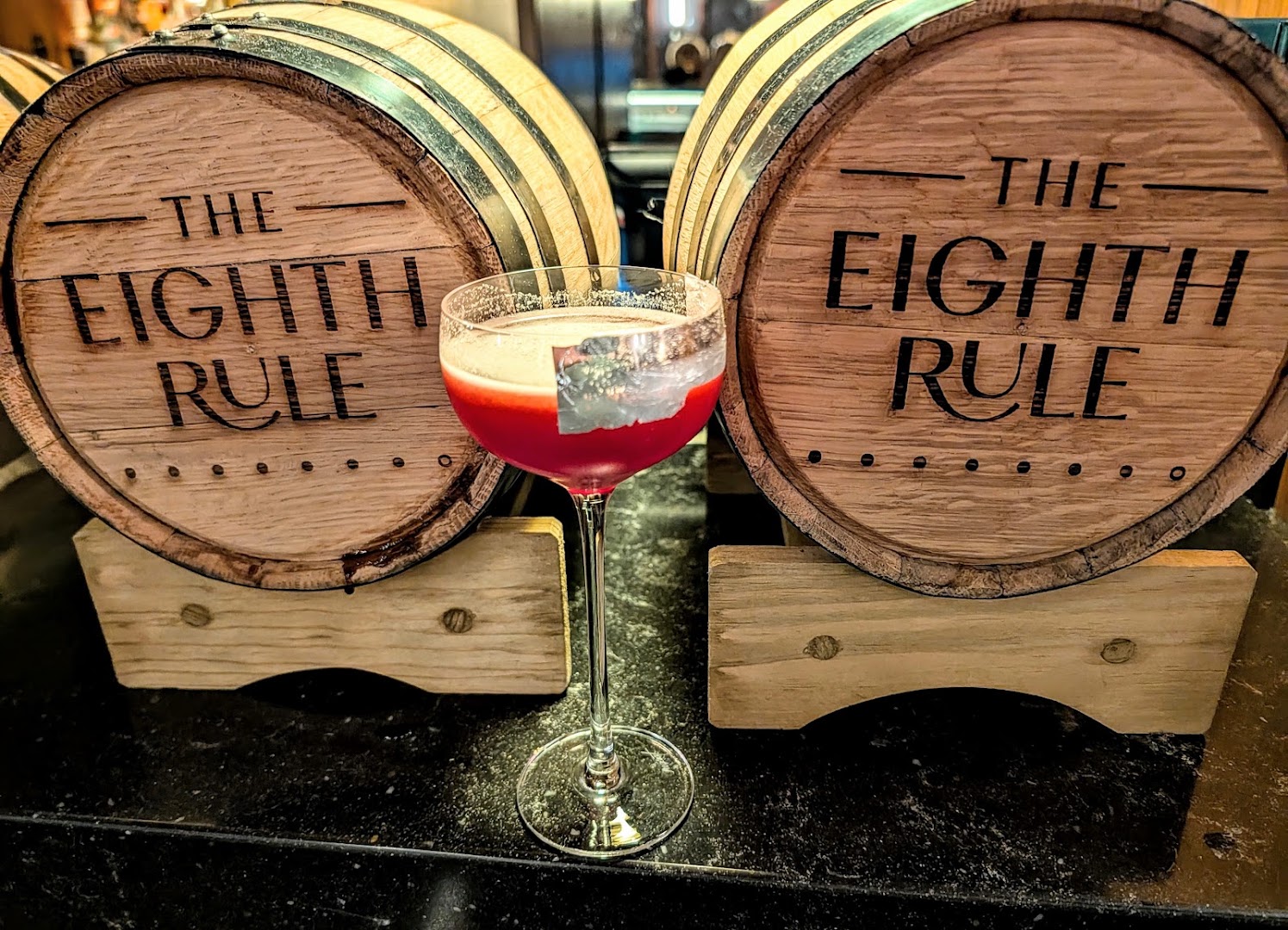 The Eighth Rule: attractive cocktail with branded barrels