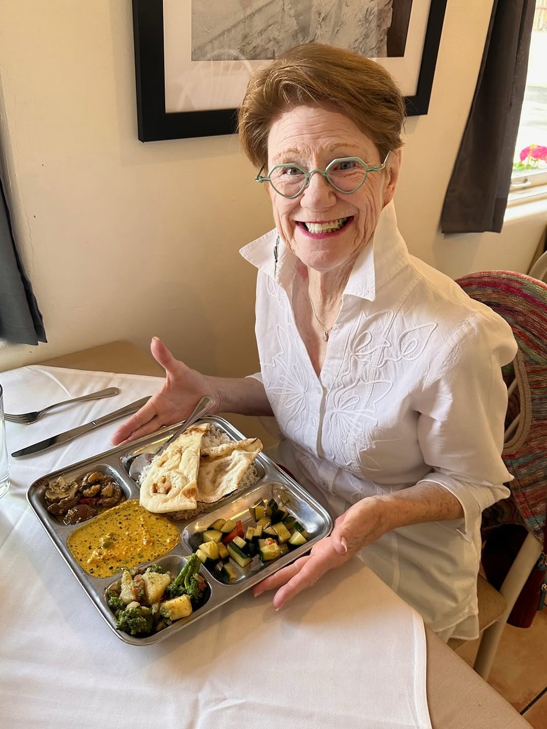 Tulsi: happy customer with restaurant food