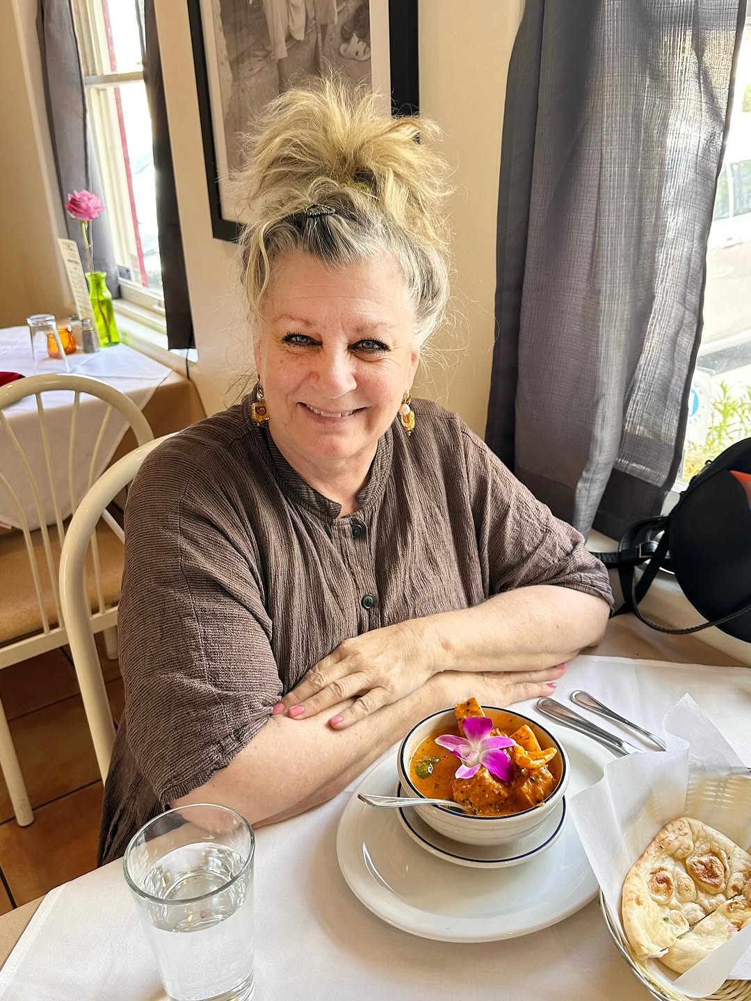Tulsi: customer enjoying meal at restaurant