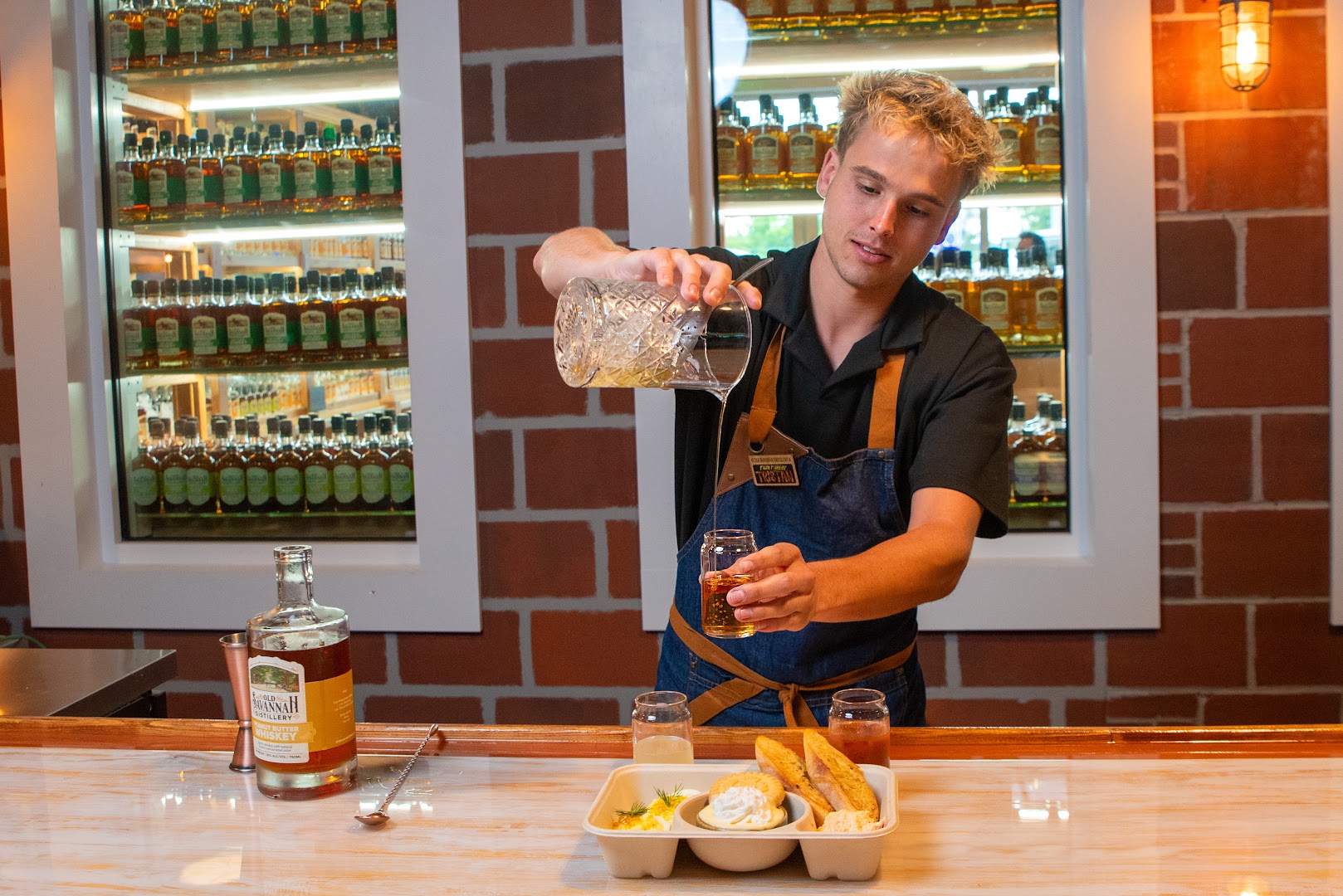 Old Savannah Distillery: professional photo of staff serving