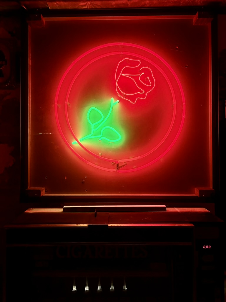 Franks Wild Years: atmospheric neon bar decor