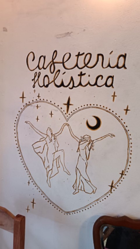 Cafetería Holística: attractive mural of venue name