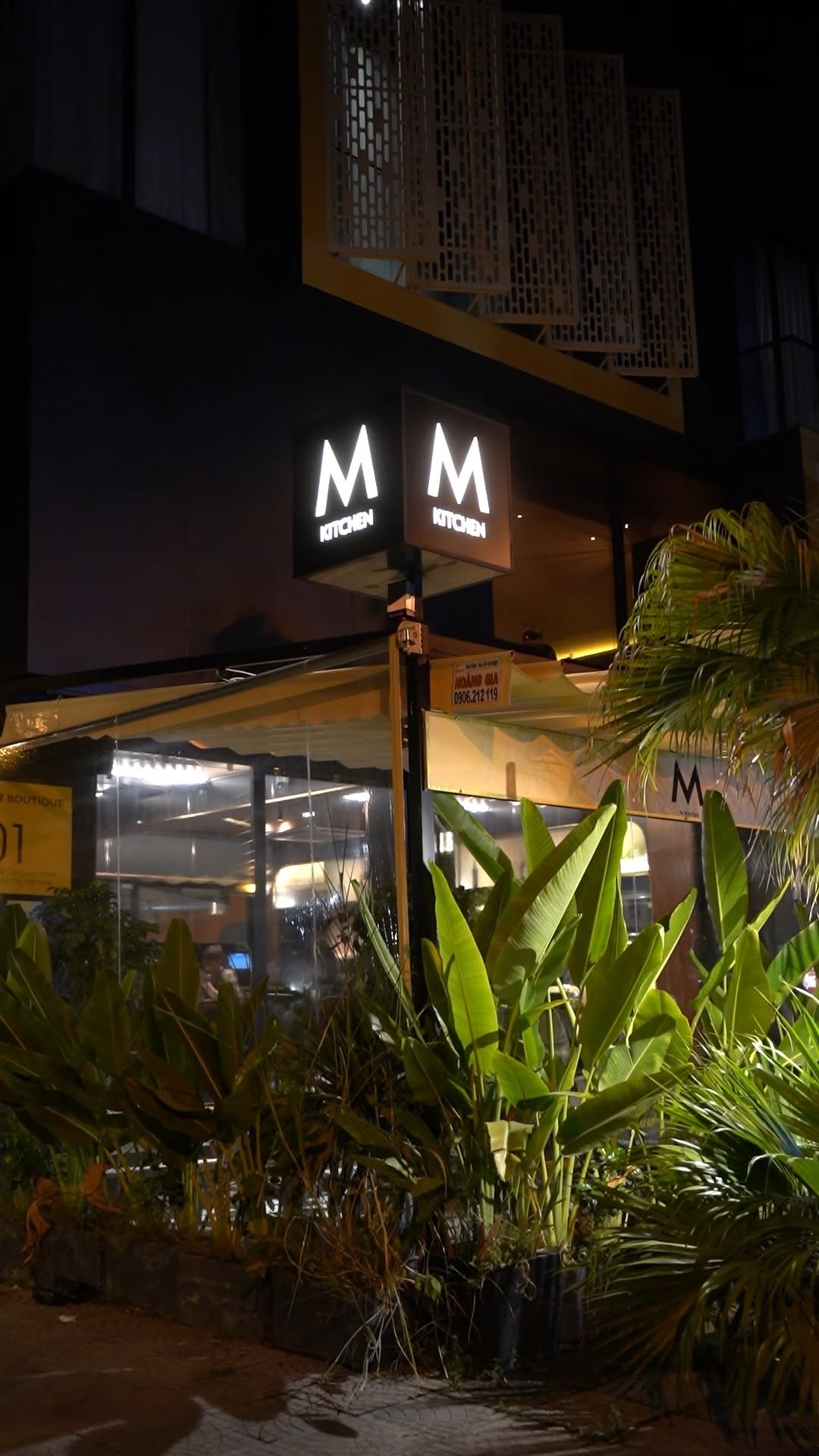 M Kitchen: clear, professional exterior night shot