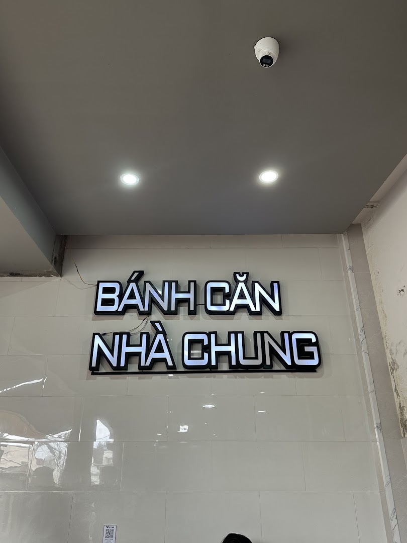 Bánh Căn Nhà Chung: clear signage identifies the venue