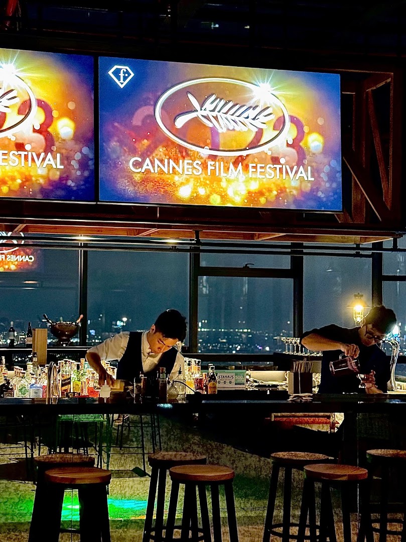 Up & Above Rooftop Bar: atmospheric shot of bar staff