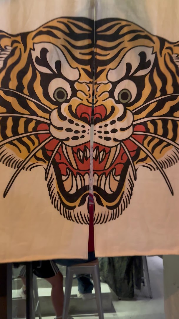 Roll Sushi Tiger: distinctive restaurant entrance decor