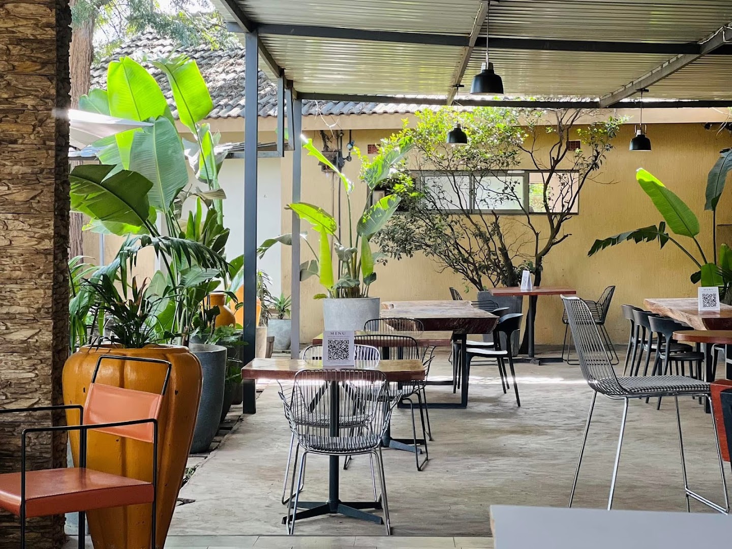 Serene Gardens Kitwe: inviting and well-lit restaurant terrace