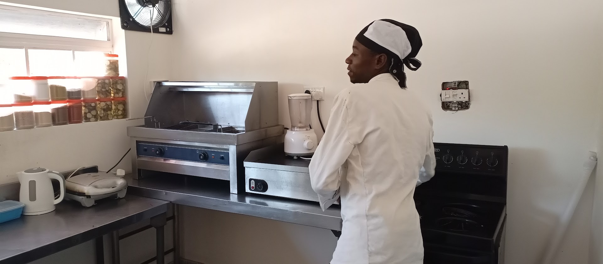 Apex Restaurant and Take Away: professional staff in kitchen environment