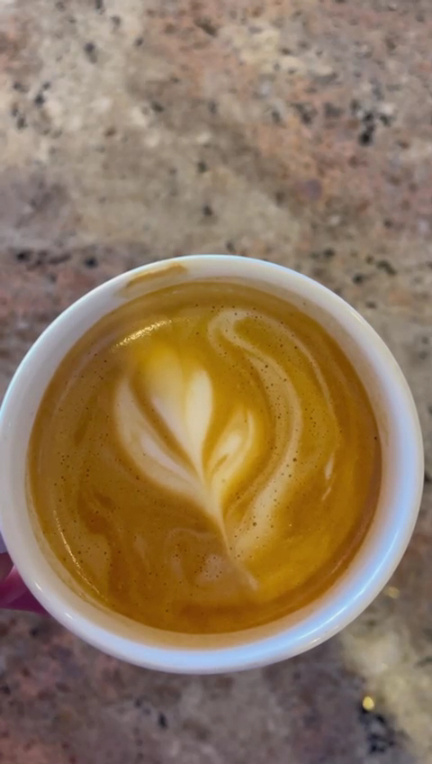 Waters Edge Coffee Roastery: high quality latte art photo
