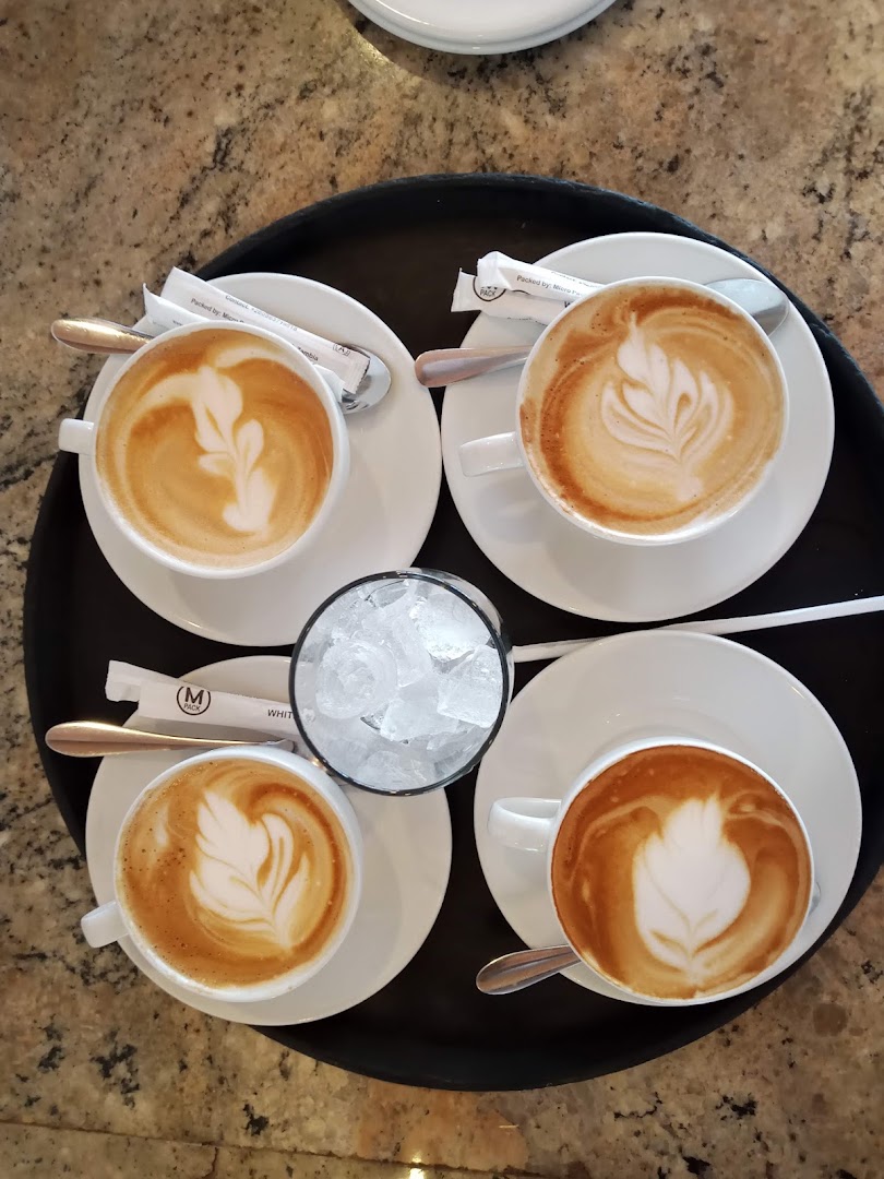 Waters Edge Coffee Roastery: appealing photo of coffee drinks