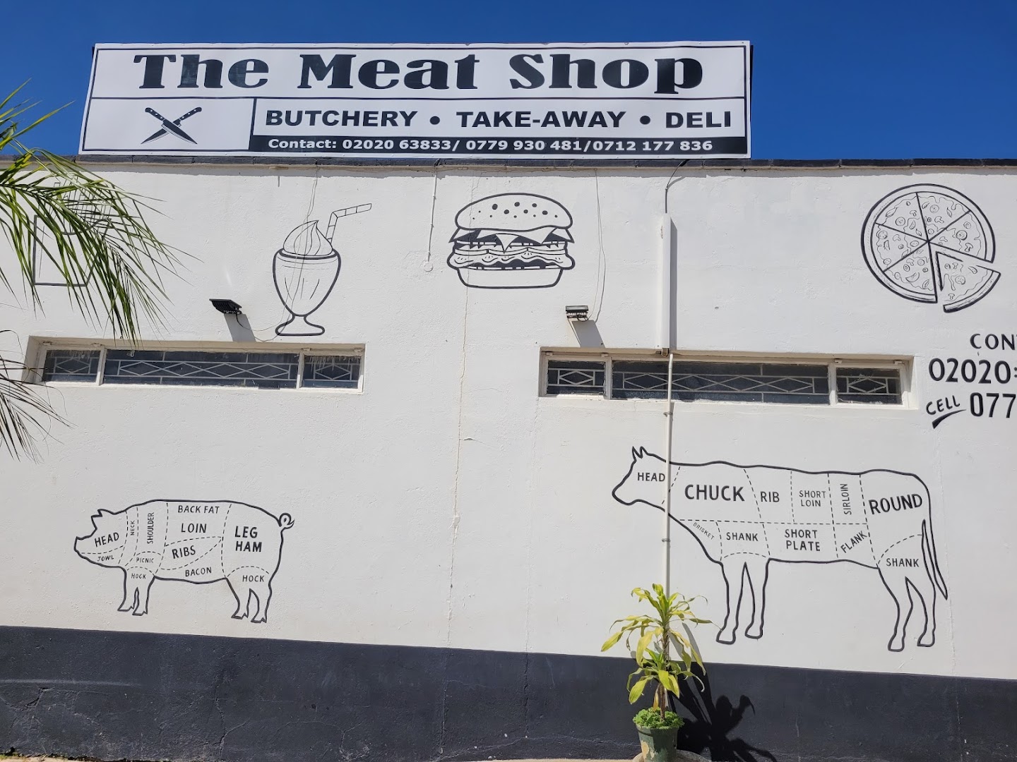 The Meat Shop: clear storefront showing shop identity